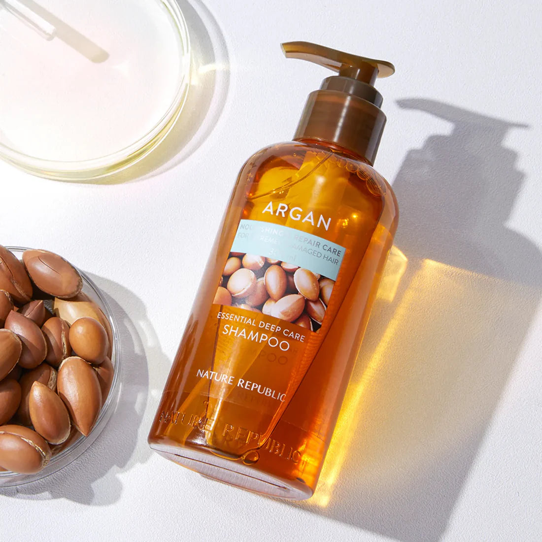 Argan Essential Moisture Repairing Shampoo Nature Republic  Glowthie