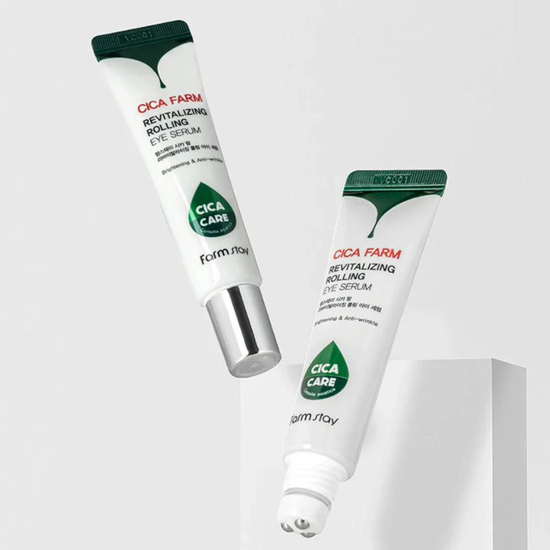Dois tubos brancos do Cica Farm Revitalizing Rolling Eye Serum, com tampas verdes. Um tubo está na vertical e o outro inclinado, ambos sobre um fundo cinzento-claro.