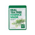 Embalagem verde e branca da Farmstay Real Tea Tree Essence Mask, com texto em destaque e ilustração de um ramo de tea tree, transmitindo frescura.