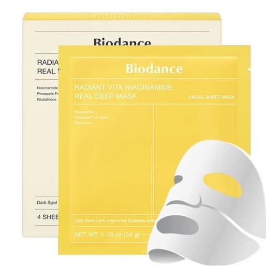 Embalagem amarela da Biodance da máscara facial em folha Radiant Vita Niacinamide, colocada à frente de uma caixa bege, com uma máscara branca sobreposta na imagem. Kbeauty.
