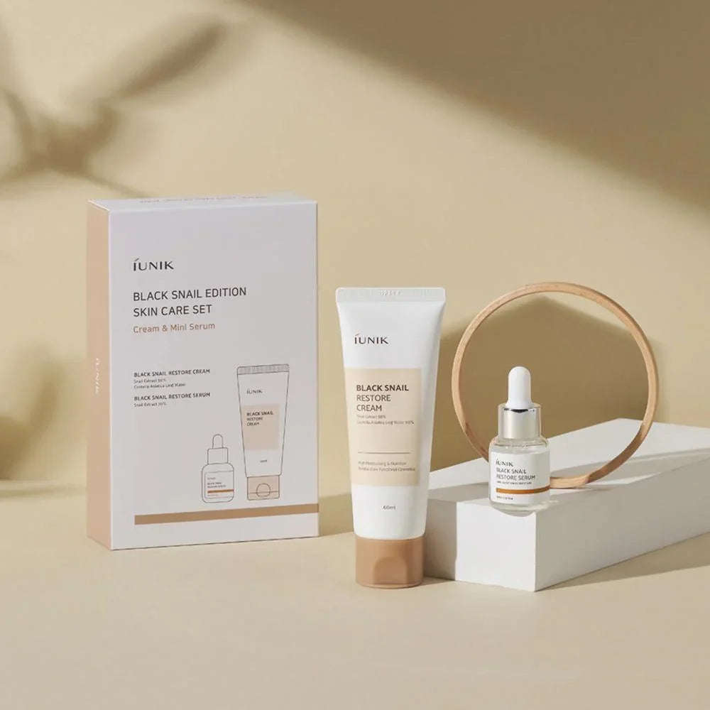 Coffret de cuidados coreanos iUNIK Black Snail com creme e sérum para regeneração da pele.