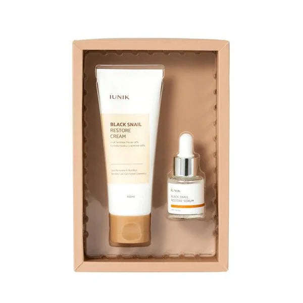 Conjunto iUNIK Black Snail com creme restaurador e sérum de cuidado facial coreano em caixa.