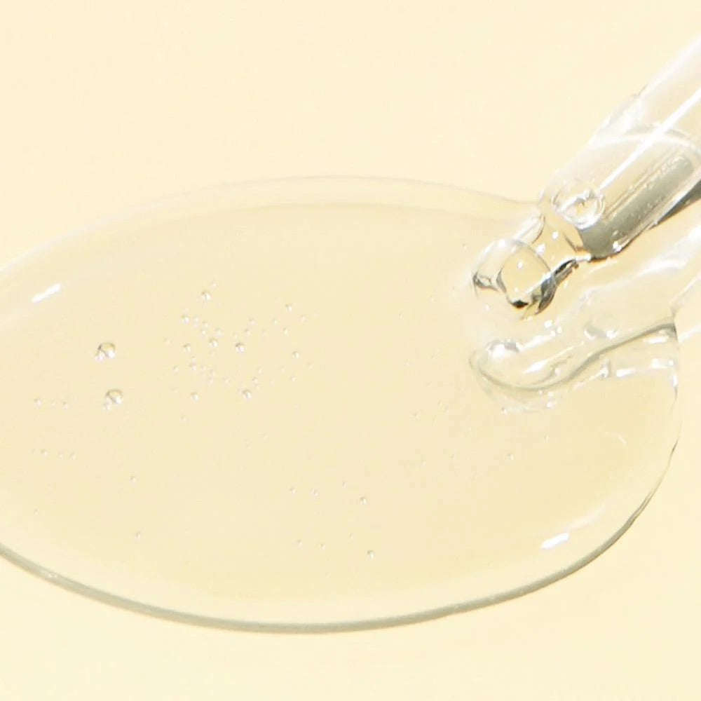 Sérum iluminador C-Niacin com vitamina C e niacinamida. Frasco de ampola laranja Isntree C‑Niacin com conta‑gotas