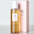 Óleo de limpeza facial coreano com ginseng, embalagem e caixa elegante sobre fundo claro.