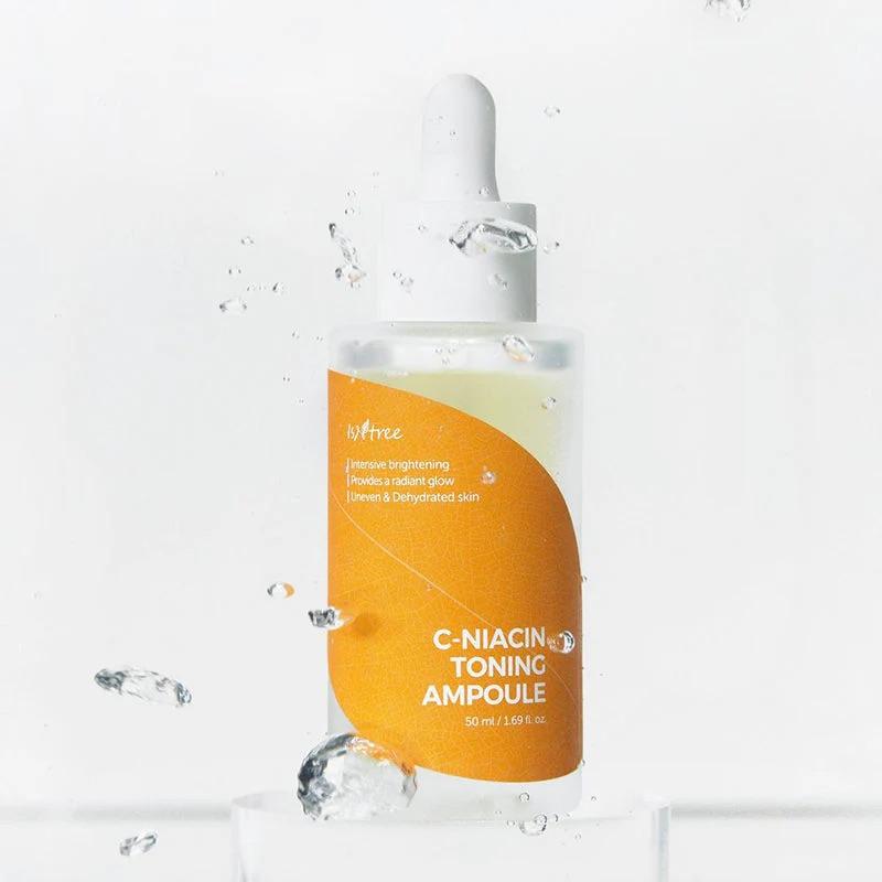 Ingredientes naturais (espinheiro‑marítimo, cúrcuma) junto ao frasco. Ampola de vitamina C estável para manchas e glow natural