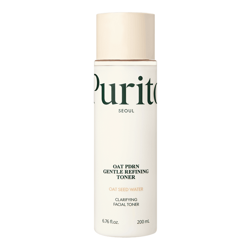 Uma garrafa cilíndrica do Purito Oat PDRN Gentle Refining Toner sobre um fundo preto. O rótulo apresenta texto em verde e destaca “Água de Semente de Aveia”.
